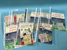 Collection of vintage 1950's and 1960's England football programmes and ticket stubs, including vs