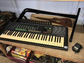 Keyboard and a ukulele