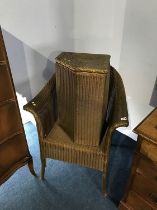 A gold Lloyd Loom linen box and chair