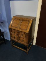 A barley twist oak bureau