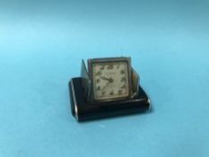 A silver enamelled Dunhill purse watch