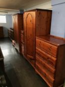 Pine Ducal bedroom suite comprising of two wardrobes, chest of drawers, pair of bedside chests and a
