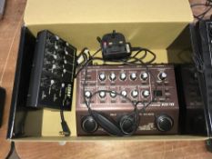 A boxed Boss AD-10 acoustic pre amp