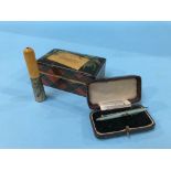 A Mauchline ware box, a cigar holder etc.