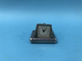 A silver Brevet purse watch