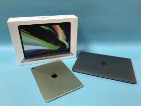 A MacBook Pro and an IPad (both locked)