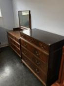A mahogany chest of drawers and dressing chest