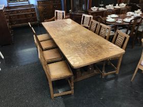 A 1970's Sid Pollard Mouseman design solid oak refectory table and a set of eight lattice back