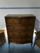 Walnut serpentine chest of drawers