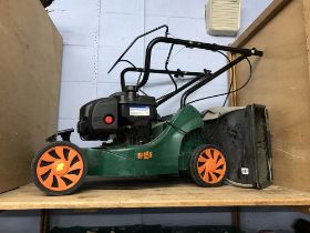 A petrol lawn mower