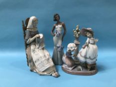 Two Lladro figures and one Nao figure (3)