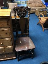 A pair of oak 'Grotesque' mask single hall chairs