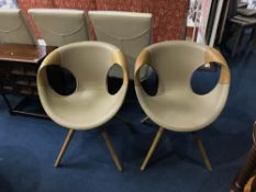 A pair of Tonon Italian chairs, designed by Martin Ballendat