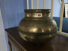An Indian brass cooking pot