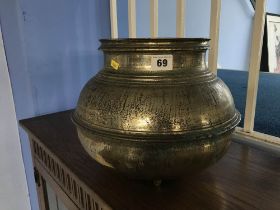 An Indian brass cooking pot