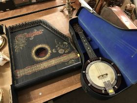 A guitar-zither and a mandolin