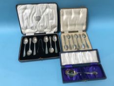 Two sets of cased silver spoons and one other