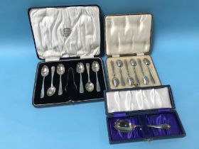 Two sets of cased silver spoons and one other
