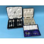 Two sets of cased silver spoons and one other