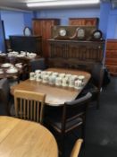 Oak barley twist table, four chairs and an oak dresser