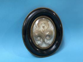 A 19th Century French oval mourning miniature, containing locks of hair