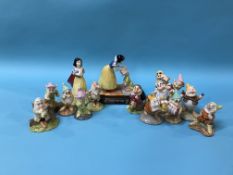 A collection of Royal Doulton Snow White and the Dwarfs (13)