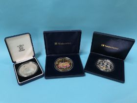 Three silver five ounce coins, in cases, 15oz