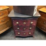 A small decorative painted serpentine chest of drawers, W 70cm