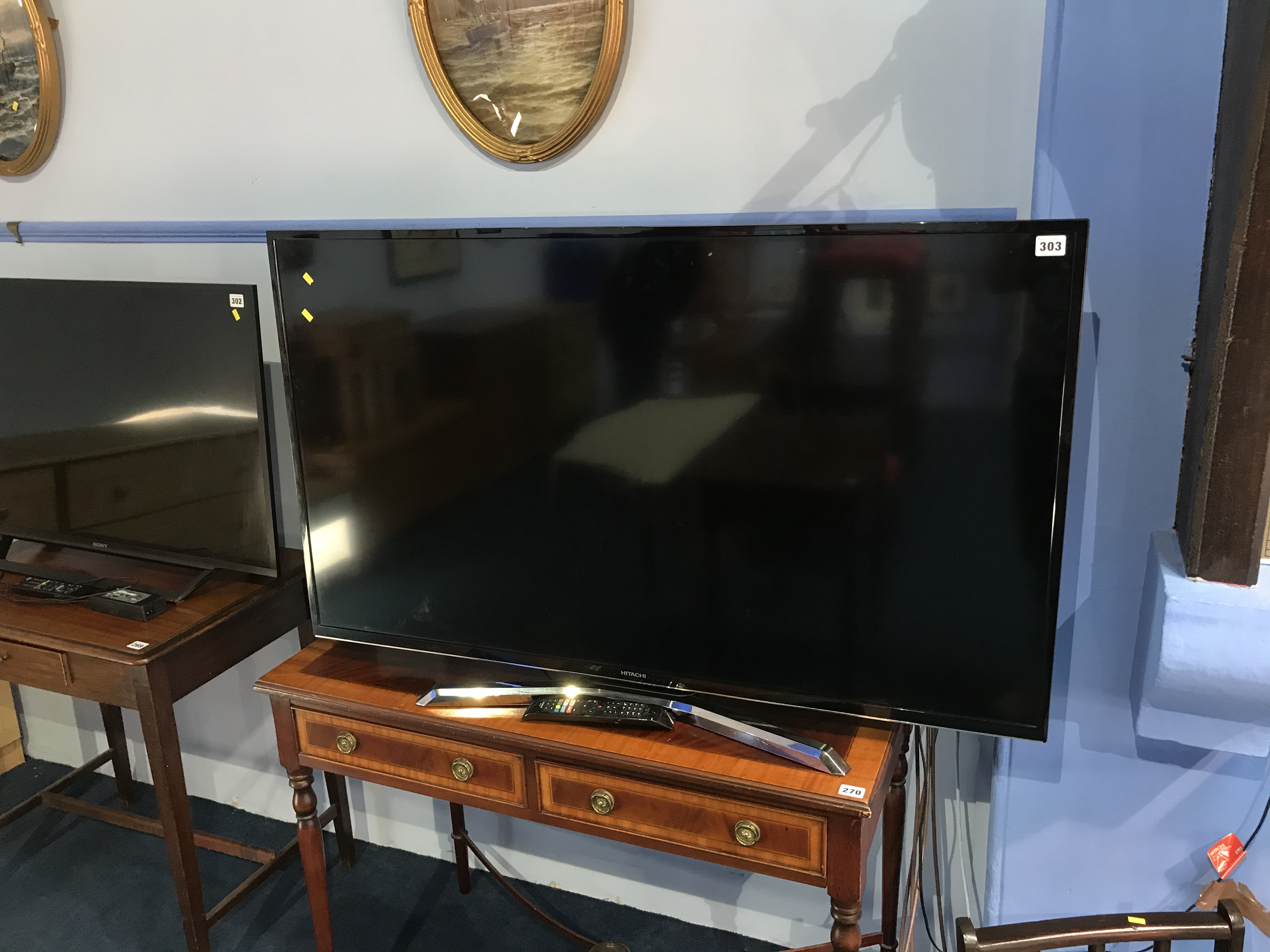 A 50" Hitachi television