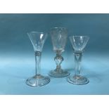 A 19th Century acid etched wine glass and two tear drop wine glasses