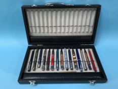 A cased collection of pens, including Nova, Parker etc