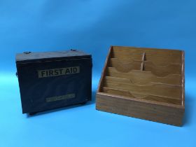 A first aid box and a letter rack