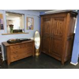 A Bernard Siguier double door wardrobe and chest of drawers