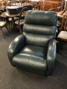 Green leather recliner armchair