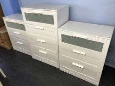 Three white chest of drawers