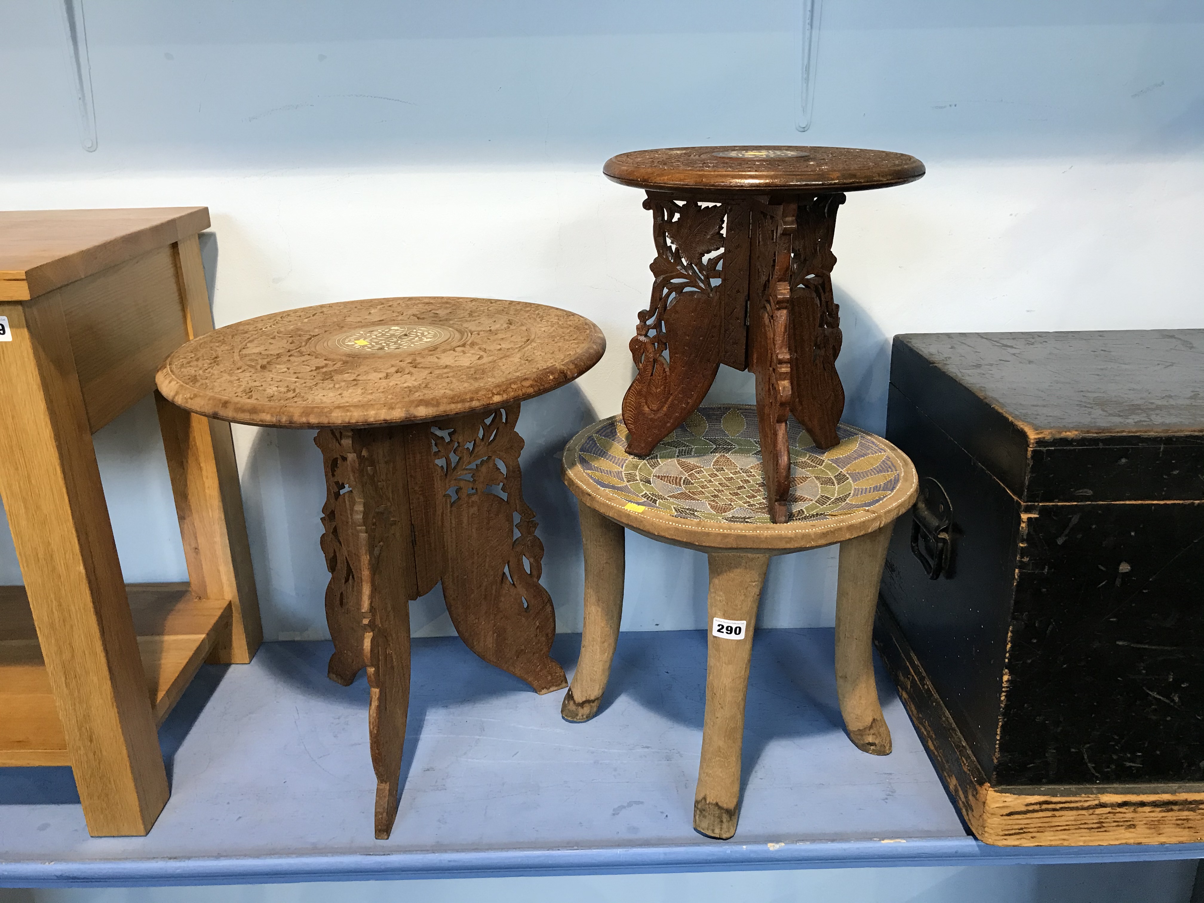 A Tribal stool and two Indian occasional tables