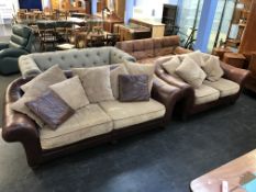 A brown leather three seater settee and a two seater settee