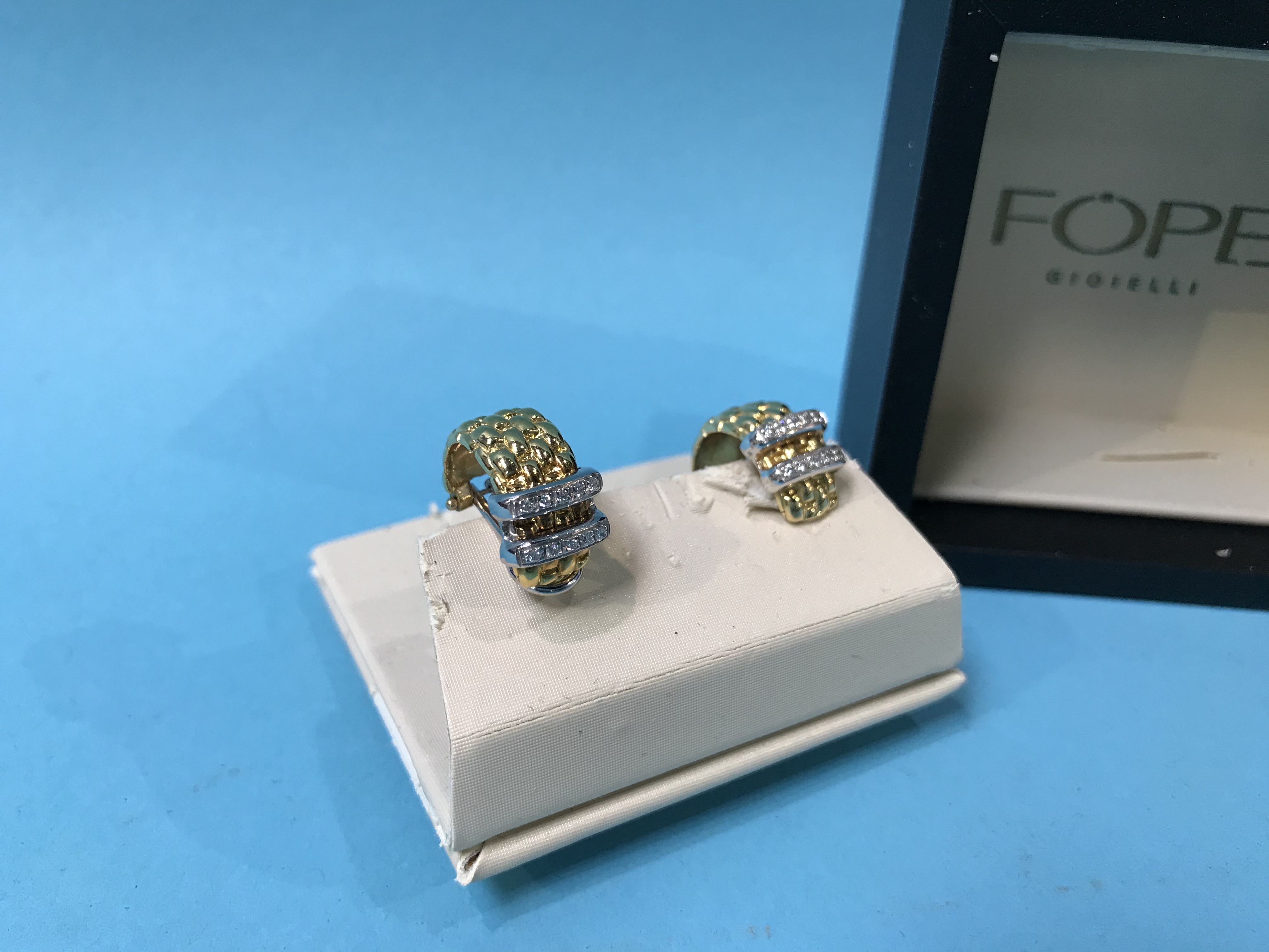 A boxed Fope pair of 18ct gold and diamond earrings, stamped '750' and 'CT 0.09' - Image 2 of 2