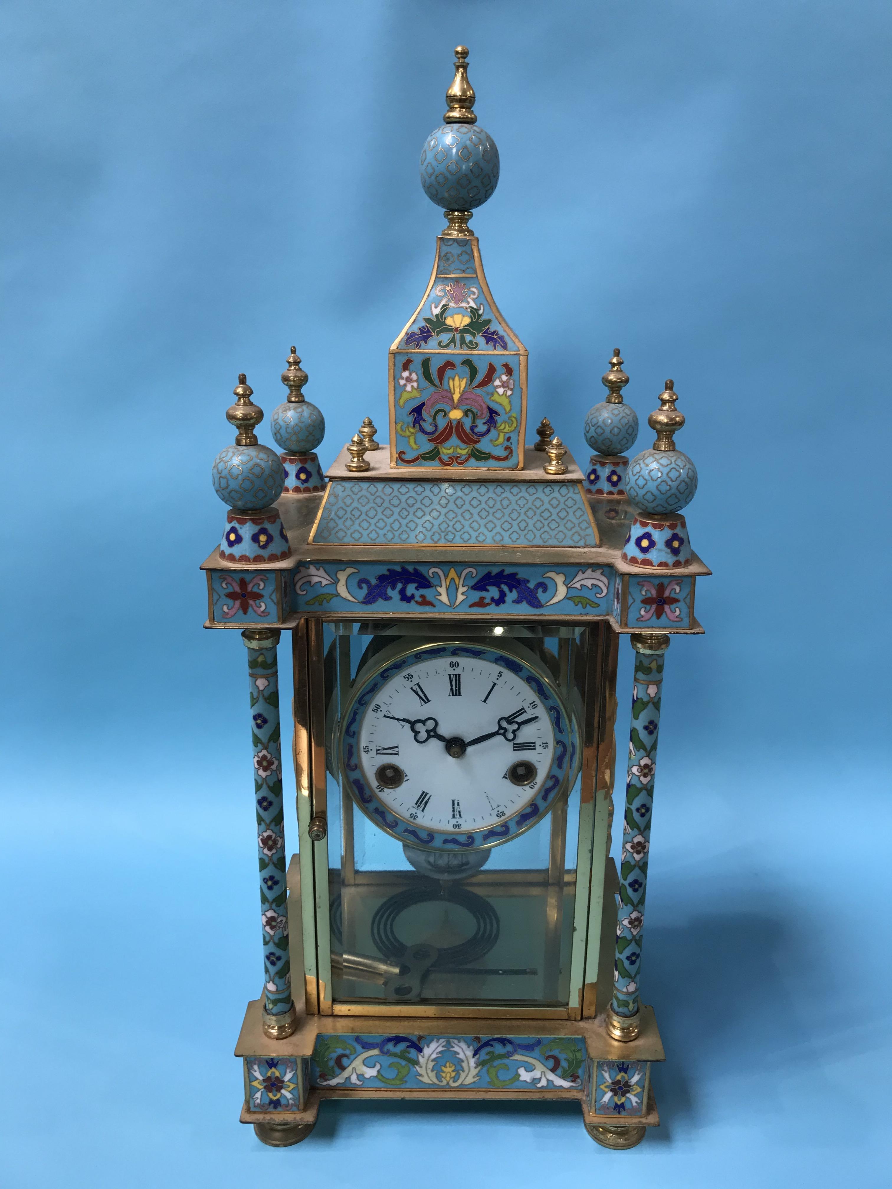 A Cloisonne decorated eight day clock, with strike action
