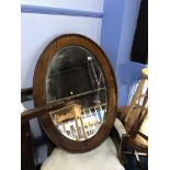 Large mahogany oval mirror, 97cm x 72cm