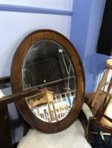 Large mahogany oval mirror, 97cm x 72cm