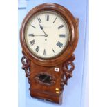 A mahogany wall clock by Campbell & Company