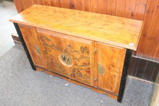 An Oriental design cabinet