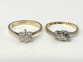 An 18ct ring, 2.4g and a 9ct ring, 1.8g