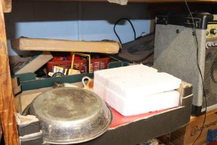 Shelf of assorted including a Carlsbro amp