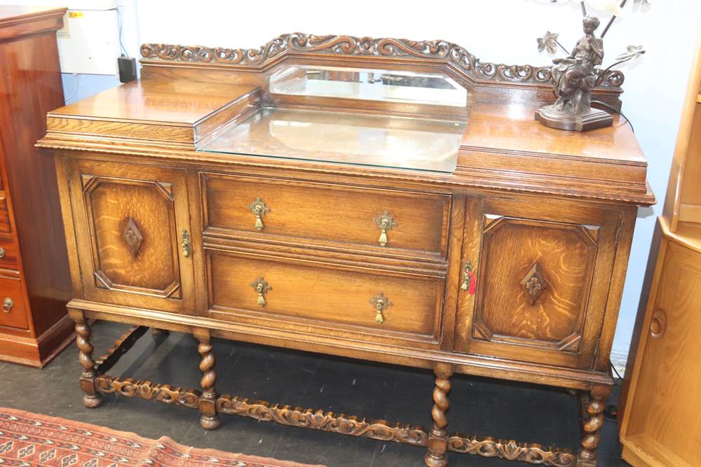 A 1920's oak barley twist sideboard