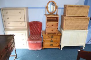 Two chest of drawers, pine bedside chests, wicker baskets etc