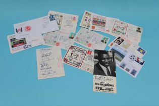 A collection of signed football first day covers