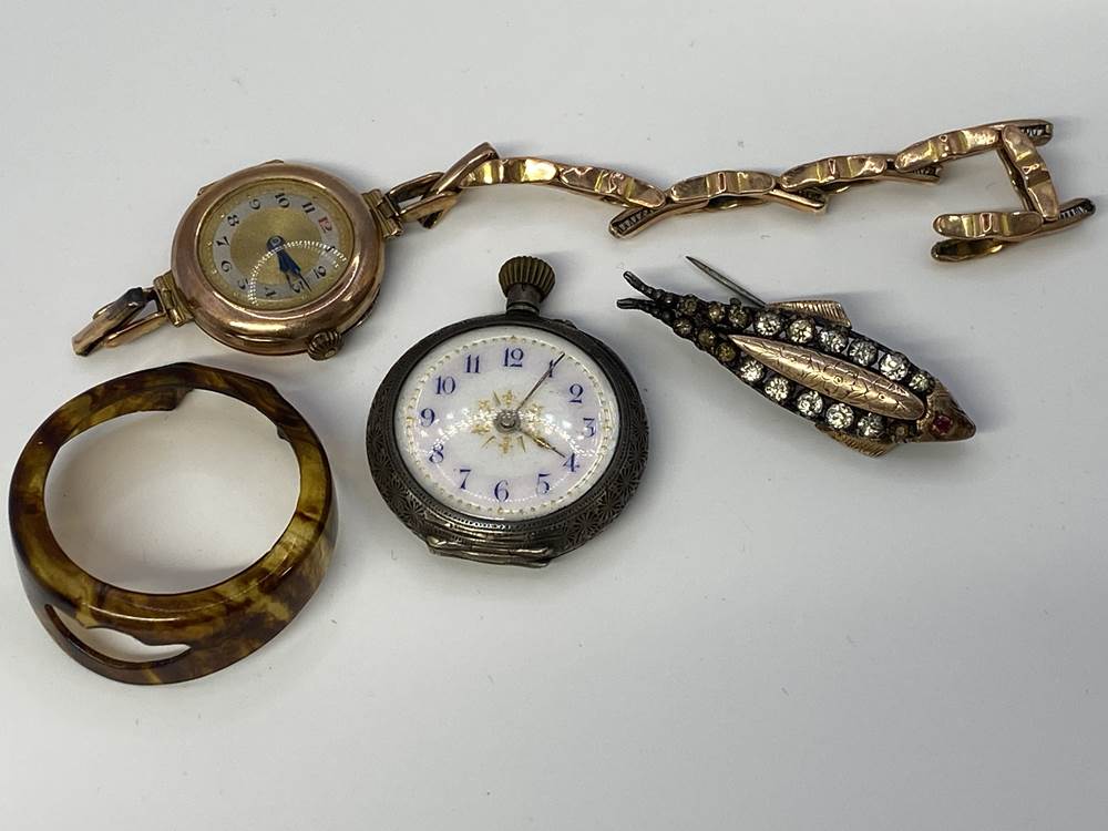 A ladies 9ct gold wristwatch, a Continental pocket watch and a brooch