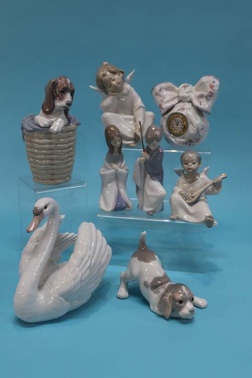 A collection of eight various Lladro ornaments